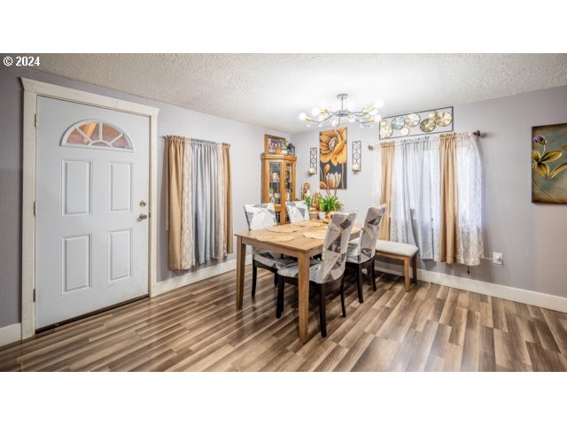 32907 Southwest Acacia Court, Unit 68 Cornelius, OR 97113 - Photo 2 of 15 a kitchen with a table and chairs