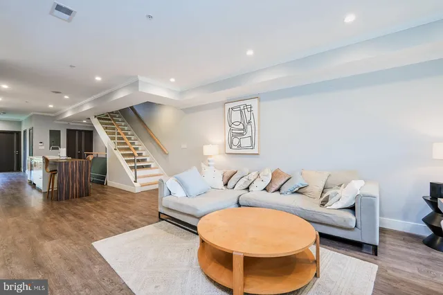 a bed room with a bed and a large window