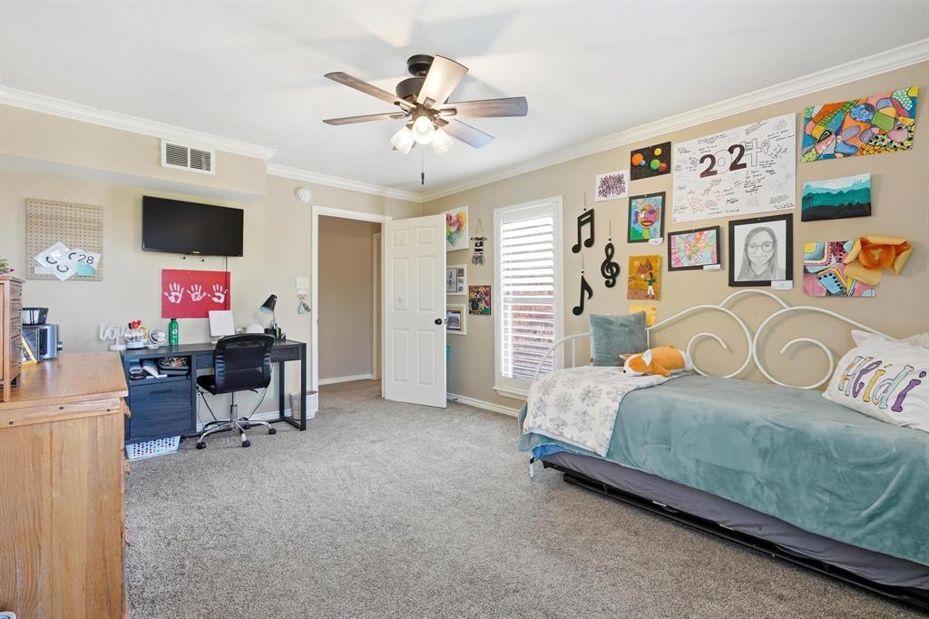 432 Clark Road Abilene, TX 79602 - Photo 27 of 40 a bedroom with a bed and furniture