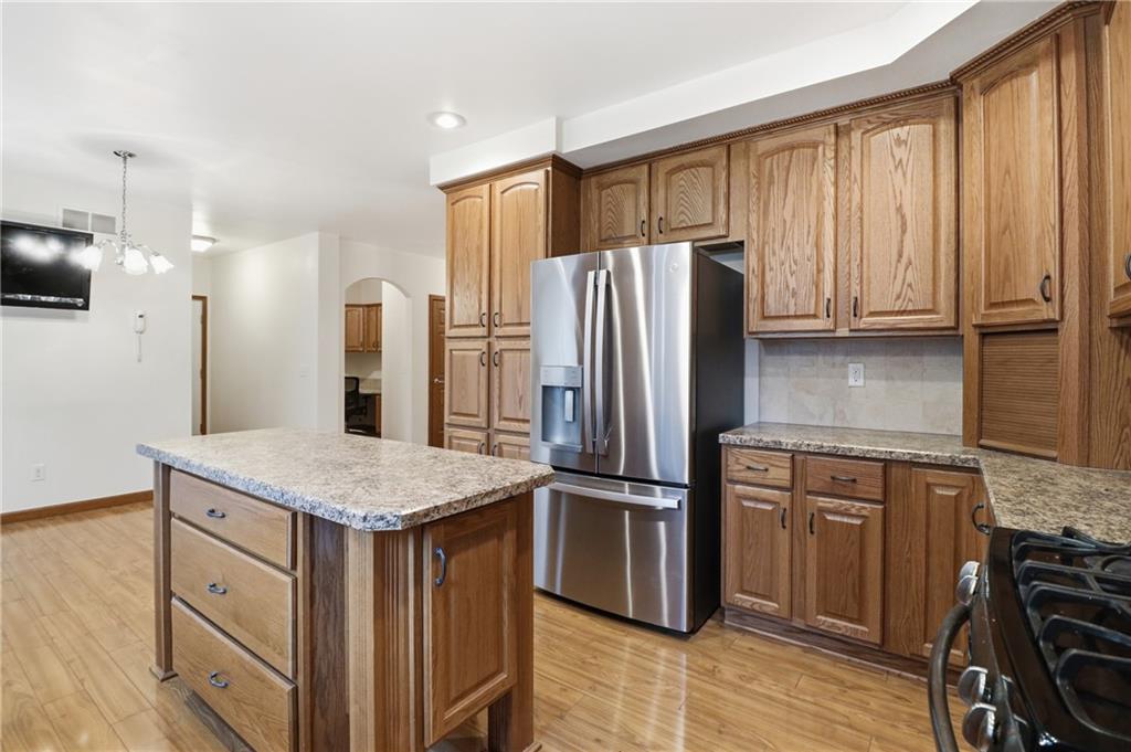 197 Smugglers Road Du Bois, PA 15801 - Photo 25 of 41 a kitchen with stainless steel appliances granite countertop a refrigerator and a stove top oven