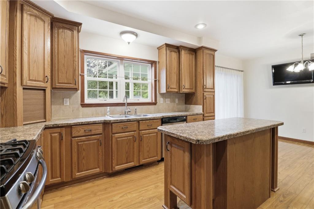 197 Smugglers Road Du Bois, PA 15801 - Photo 26 of 41 a kitchen with stainless steel appliances granite countertop a sink stove and refrigerator