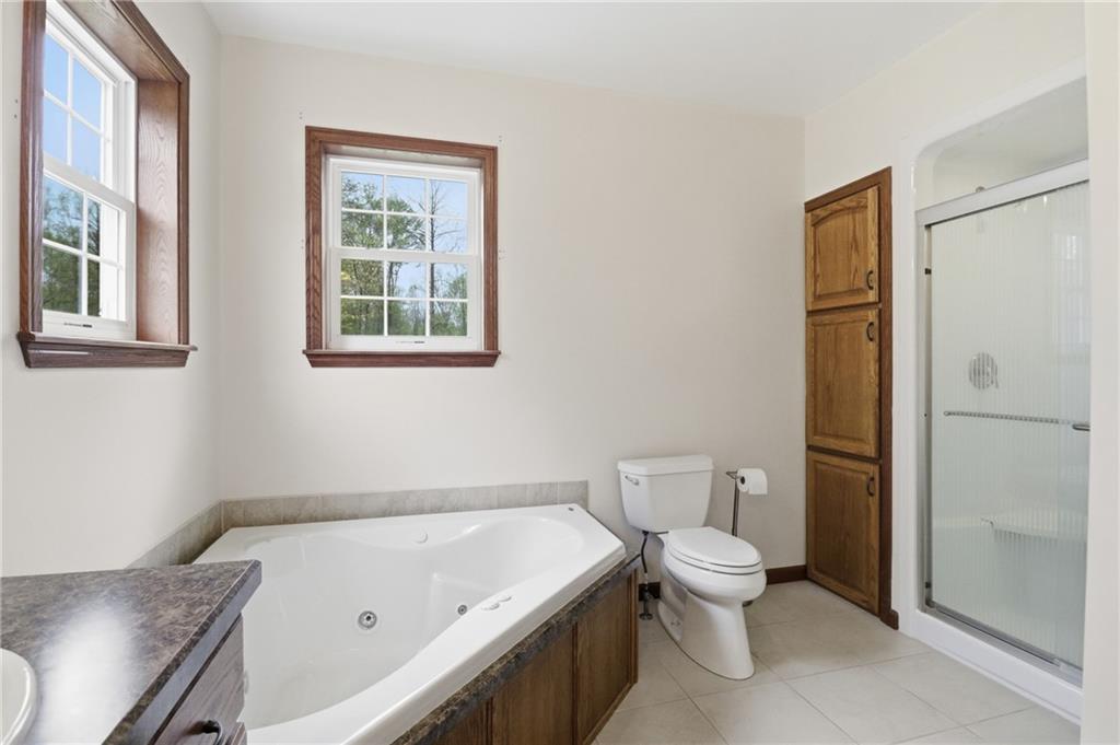 197 Smugglers Road Du Bois, PA 15801 - Photo 36 of 41 a bathroom with a granite countertop sink toilet and shower
