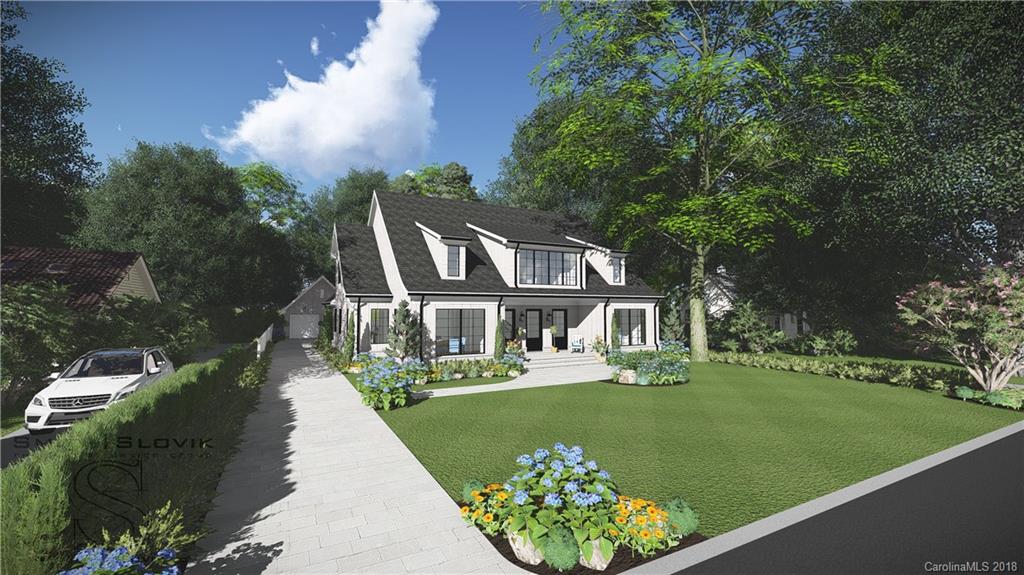 a front view of a house with a garden and trees