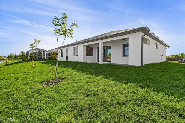 a house view with a garden space