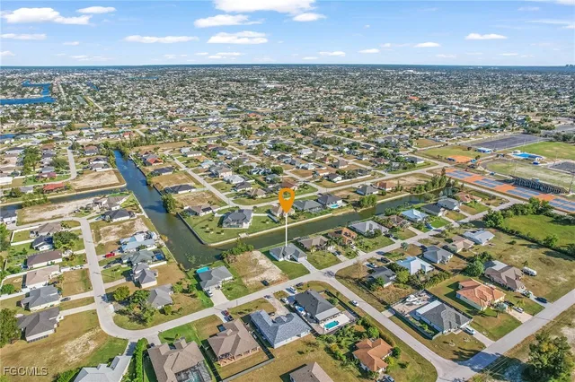 an aerial view of residential building with parking space