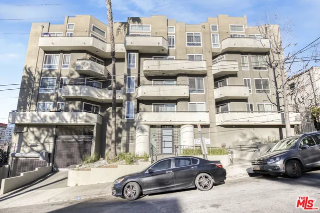 a car parked in front of a building