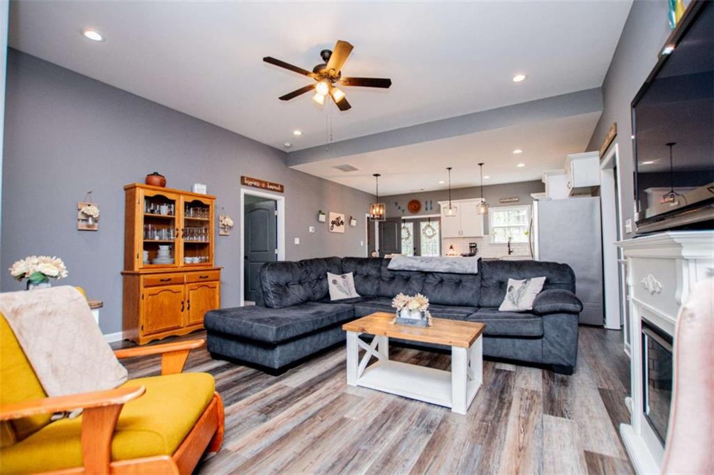 133 Pebblebrook Way Temple, GA 30179 - Photo 13 of 65 a living room with furniture and a fireplace