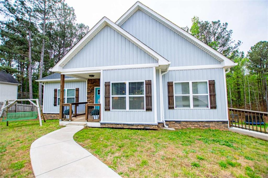 133 Pebblebrook Way Temple, GA 30179 - Photo 2 of 65 a view of front of a house with a yard