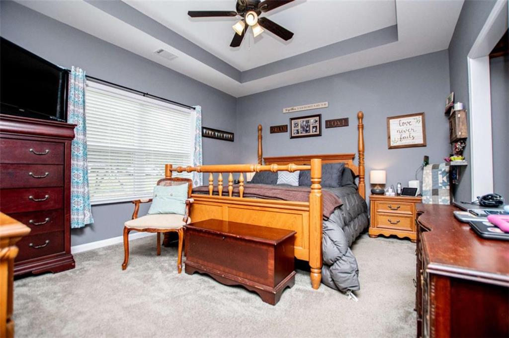 133 Pebblebrook Way Temple, GA 30179 - Photo 27 of 65 a bed room with a bed and a television
