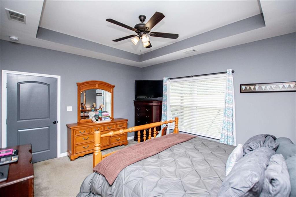 133 Pebblebrook Way Temple, GA 30179 - Photo 28 of 65 a bedroom with furniture and a large window