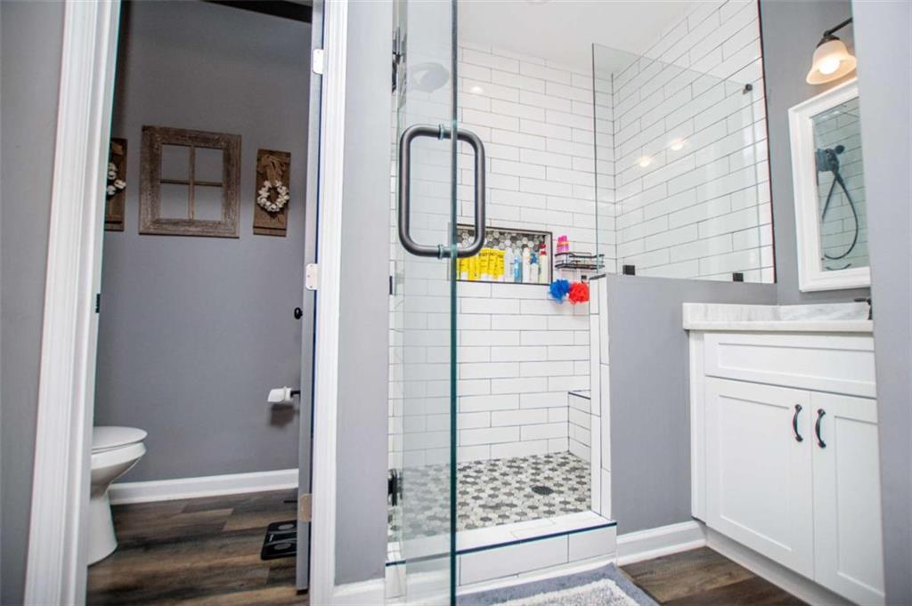 133 Pebblebrook Way Temple, GA 30179 - Photo 30 of 65 a bathroom with a sink toilet and shower