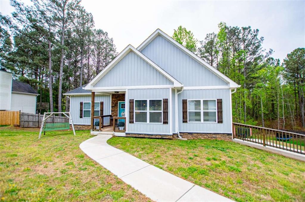 133 Pebblebrook Way Temple, GA 30179 - Photo 3 of 65 a view of a house with a yard porch and sitting area