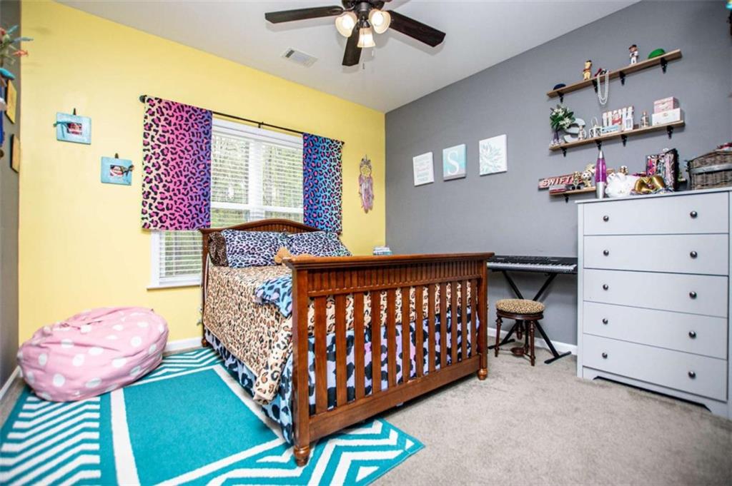 133 Pebblebrook Way Temple, GA 30179 - Photo 34 of 65 a bedroom with furniture and a window