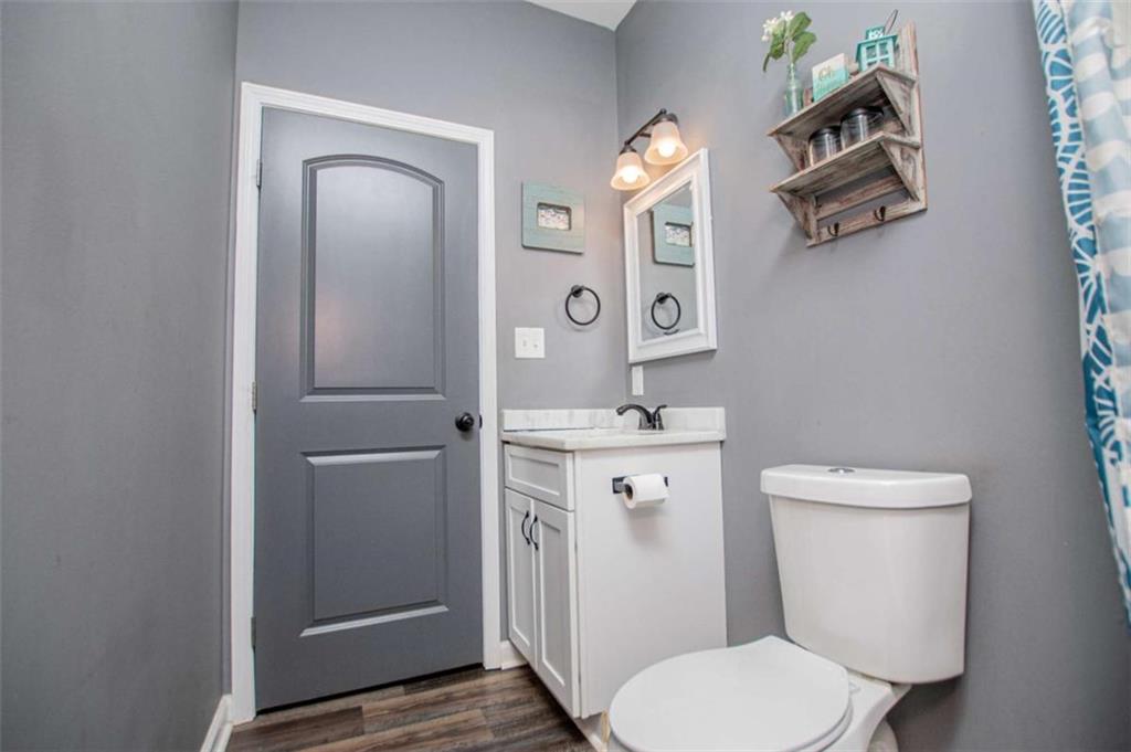 133 Pebblebrook Way Temple, GA 30179 - Photo 39 of 65 a bathroom with a toilet a sink and mirror