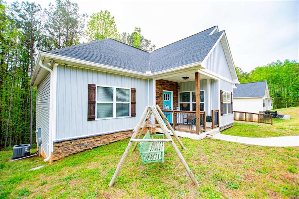 133 Pebblebrook Way Temple, GA 30179 - Photo 6 of 65 a view of a house with a yard and sitting area