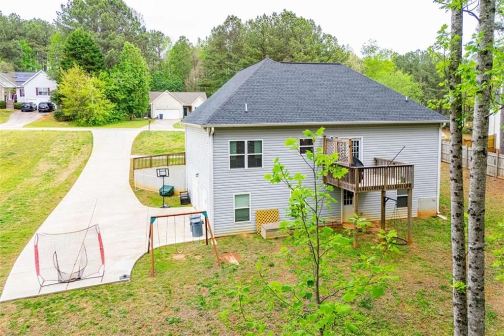 133 Pebblebrook Way Temple, GA 30179 - Photo 65 of 65 a house view with a garden space