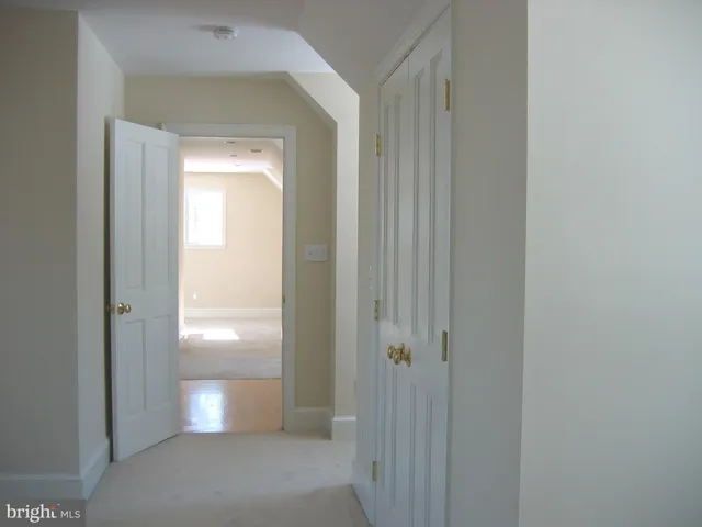 a view of a patio with table and chairs with wooden floor and fence