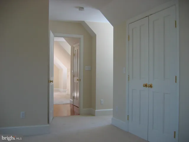 a view of a livingroom and a bathroom