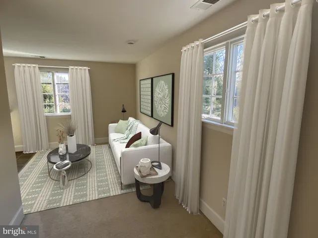 a room with a sink a counter and wooden cabinets