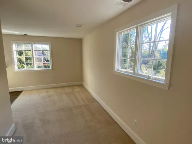 a kitchen with stainless steel appliances granite countertop a sink stove and microwave