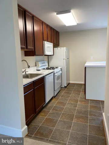 a bathroom with a shower and a bath tub