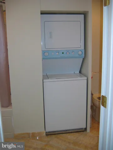 a view of a storage room with washer and dryer