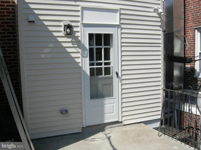 a close view of a balcony with door