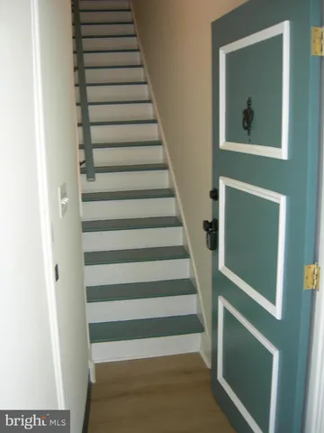 a view of a door and a window