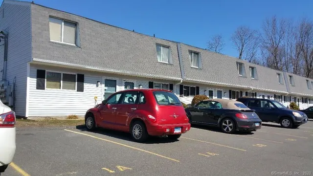 a car parked in front of a building