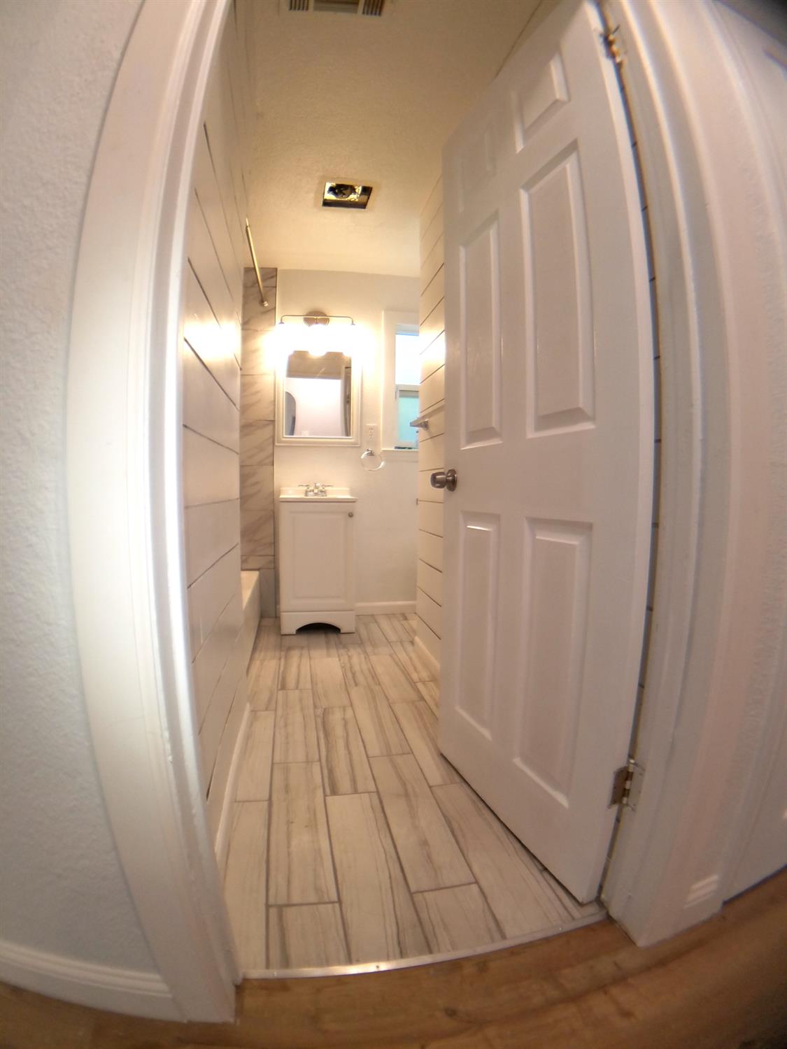 5121 Kenneth Avenue Carmichael, CA 95608 - Photo 10 of 38 a bathroom with a sink and a mirror