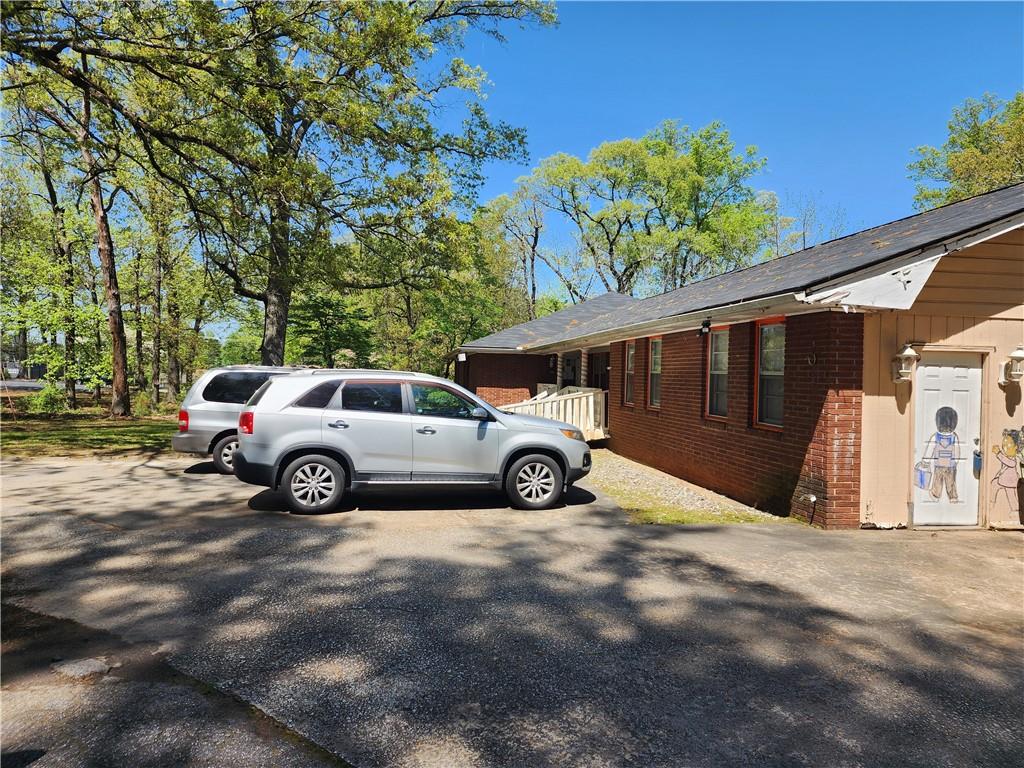 a view of a car in front of a house