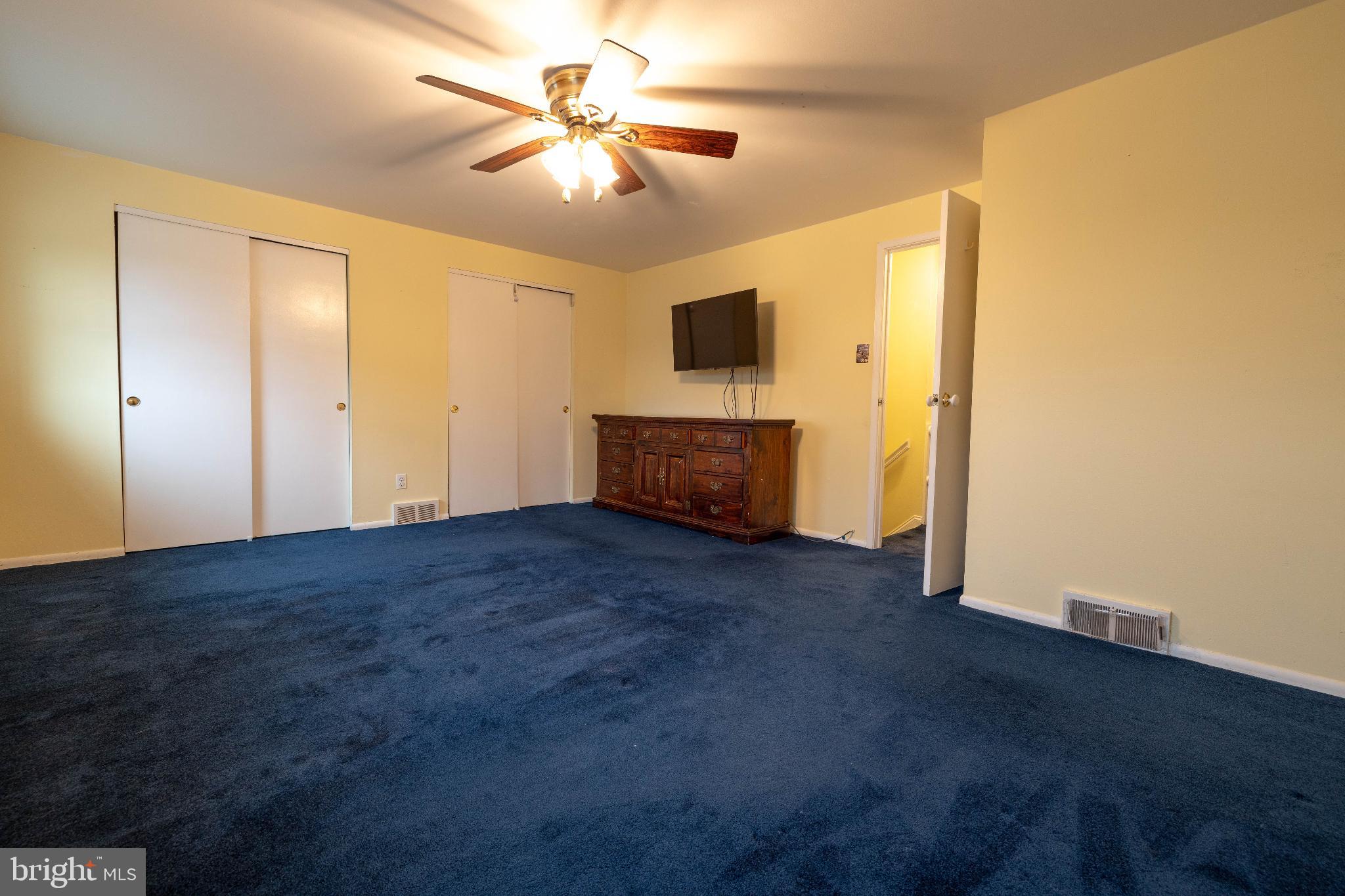 12704 Minden Road Philadelphia, PA 19154 - Photo 13 of 23 a view of a livingroom with an empty space and a ceiling fan