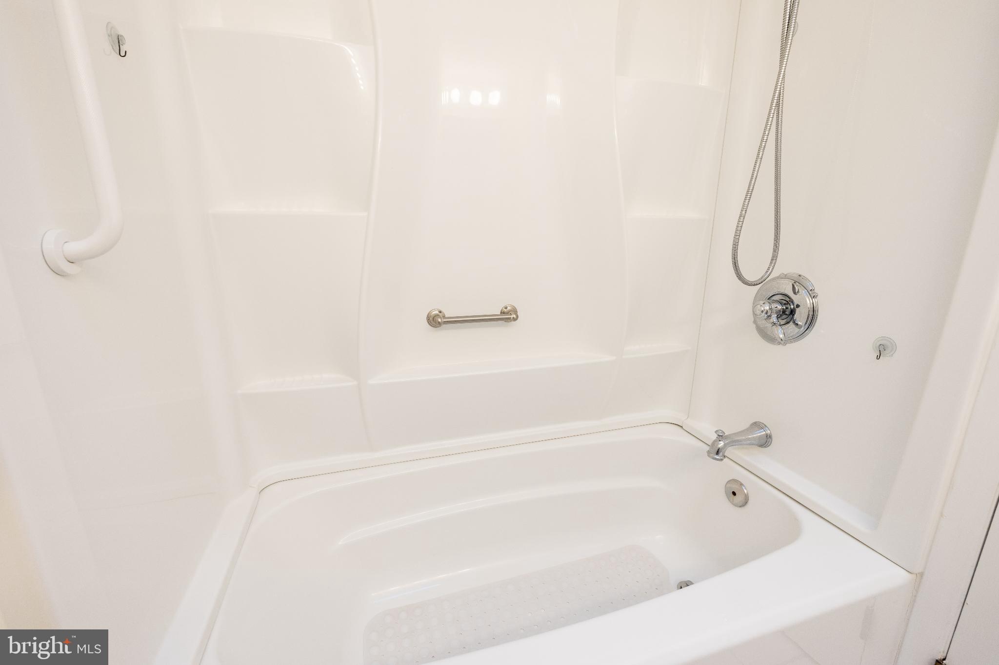 12704 Minden Road Philadelphia, PA 19154 - Photo 17 of 23 a bathroom with a bath tub with a shower