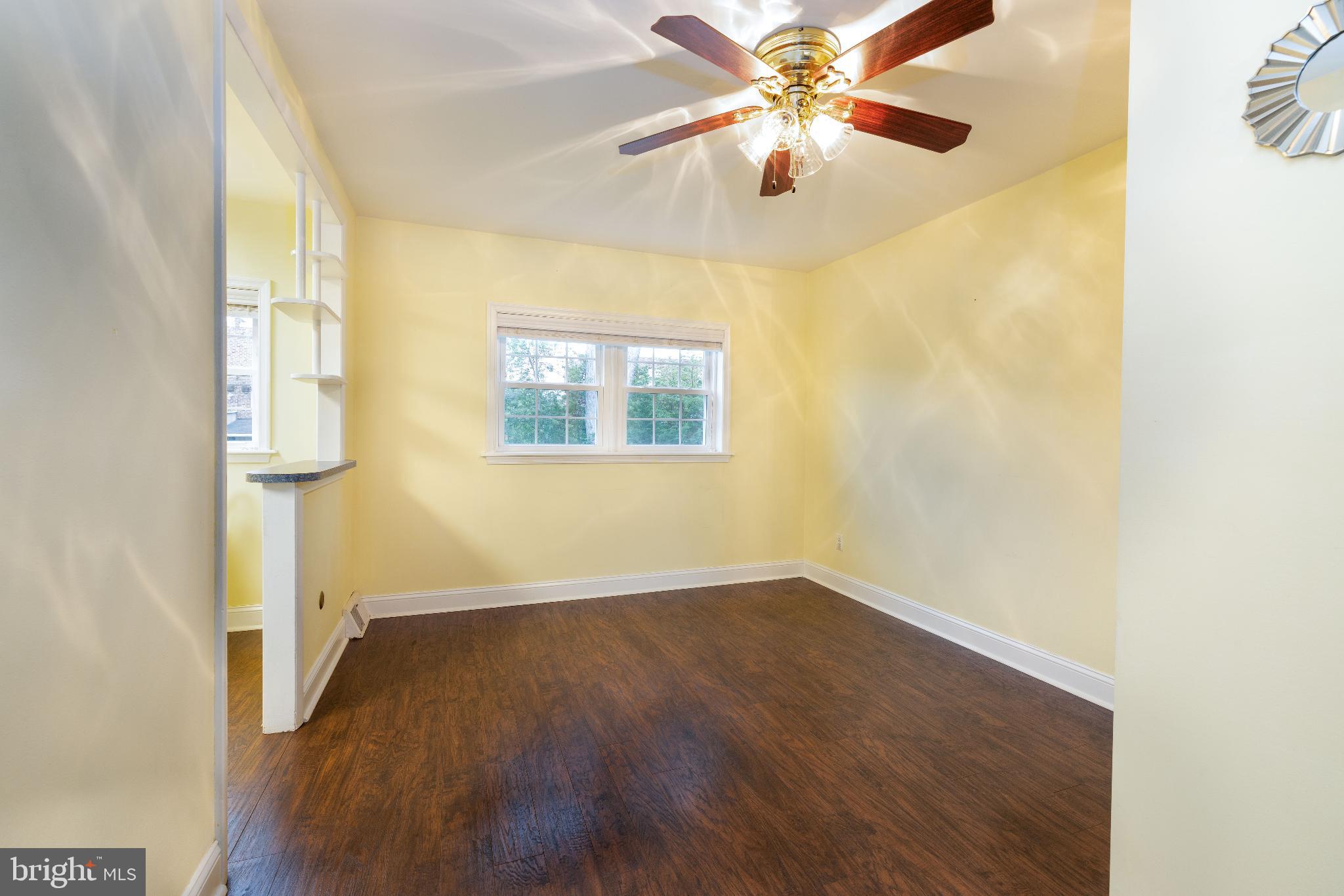 12704 Minden Road Philadelphia, PA 19154 - Photo 5 of 23 an empty room with a window and a fan