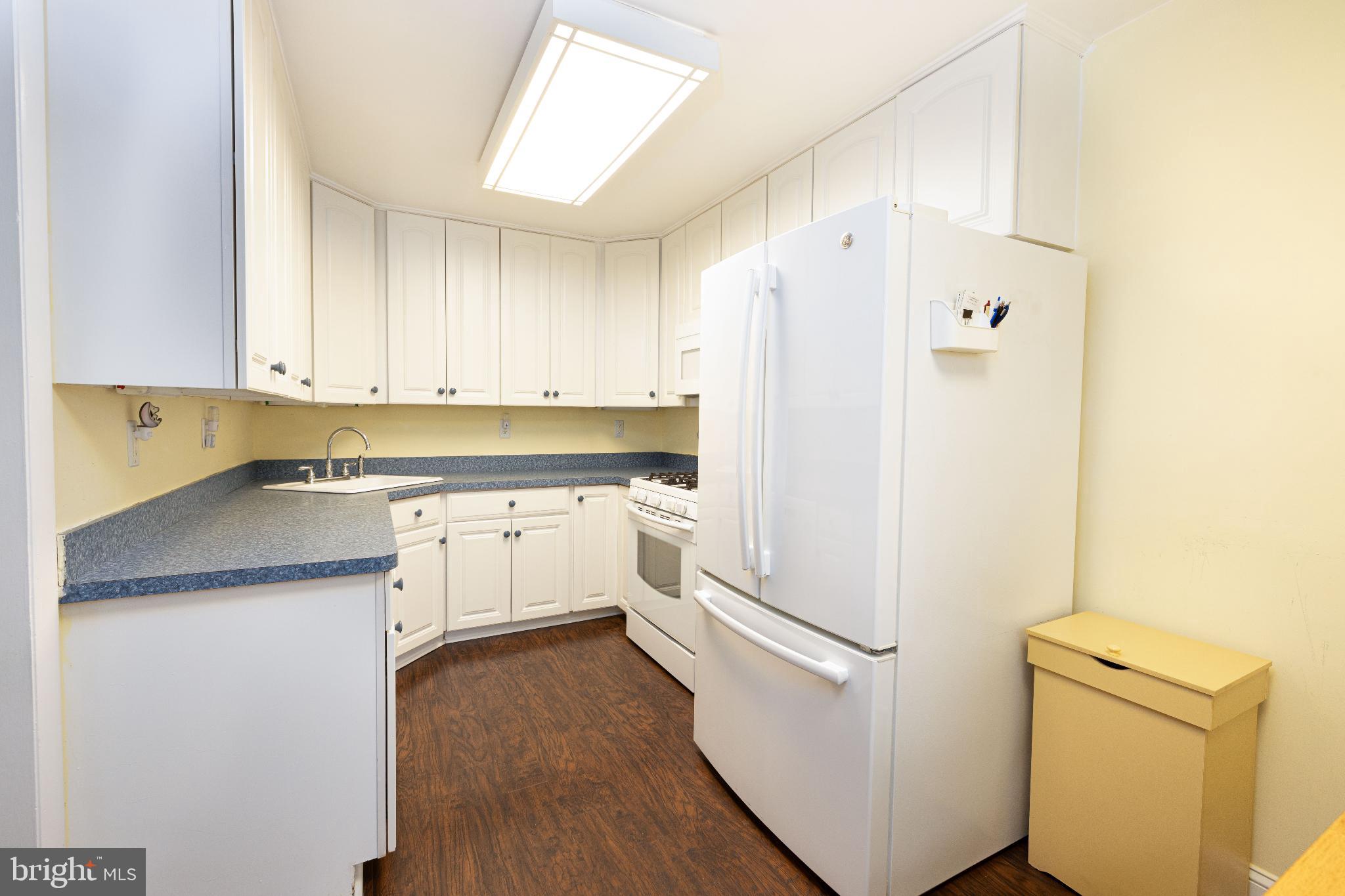 12704 Minden Road Philadelphia, PA 19154 - Photo 8 of 23 a white refrigerator freezer sitting inside of a kitchen
