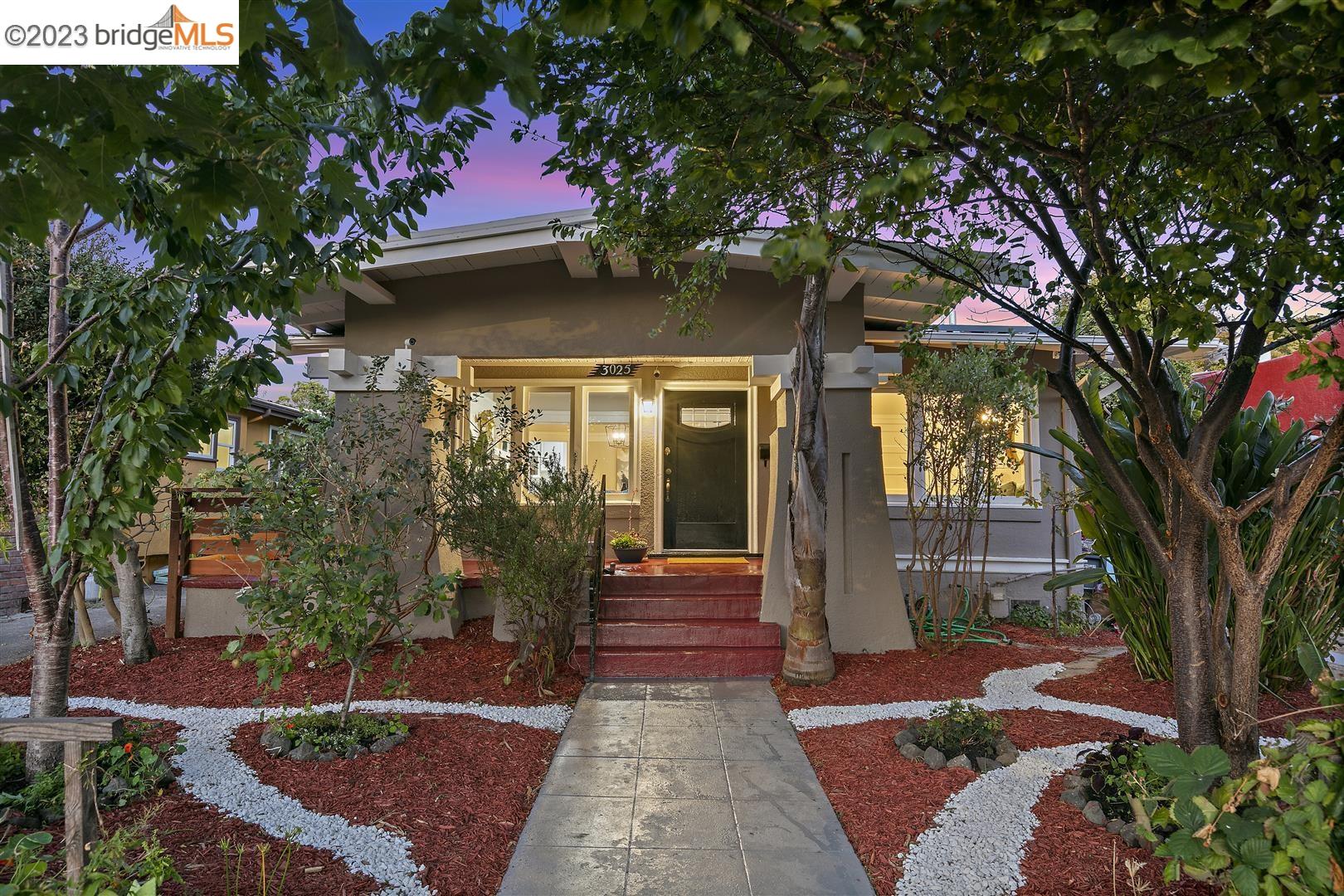 3025 Dohr Street Berkeley, CA 94702 - Photo 1 of 1 a front view of a house with garden