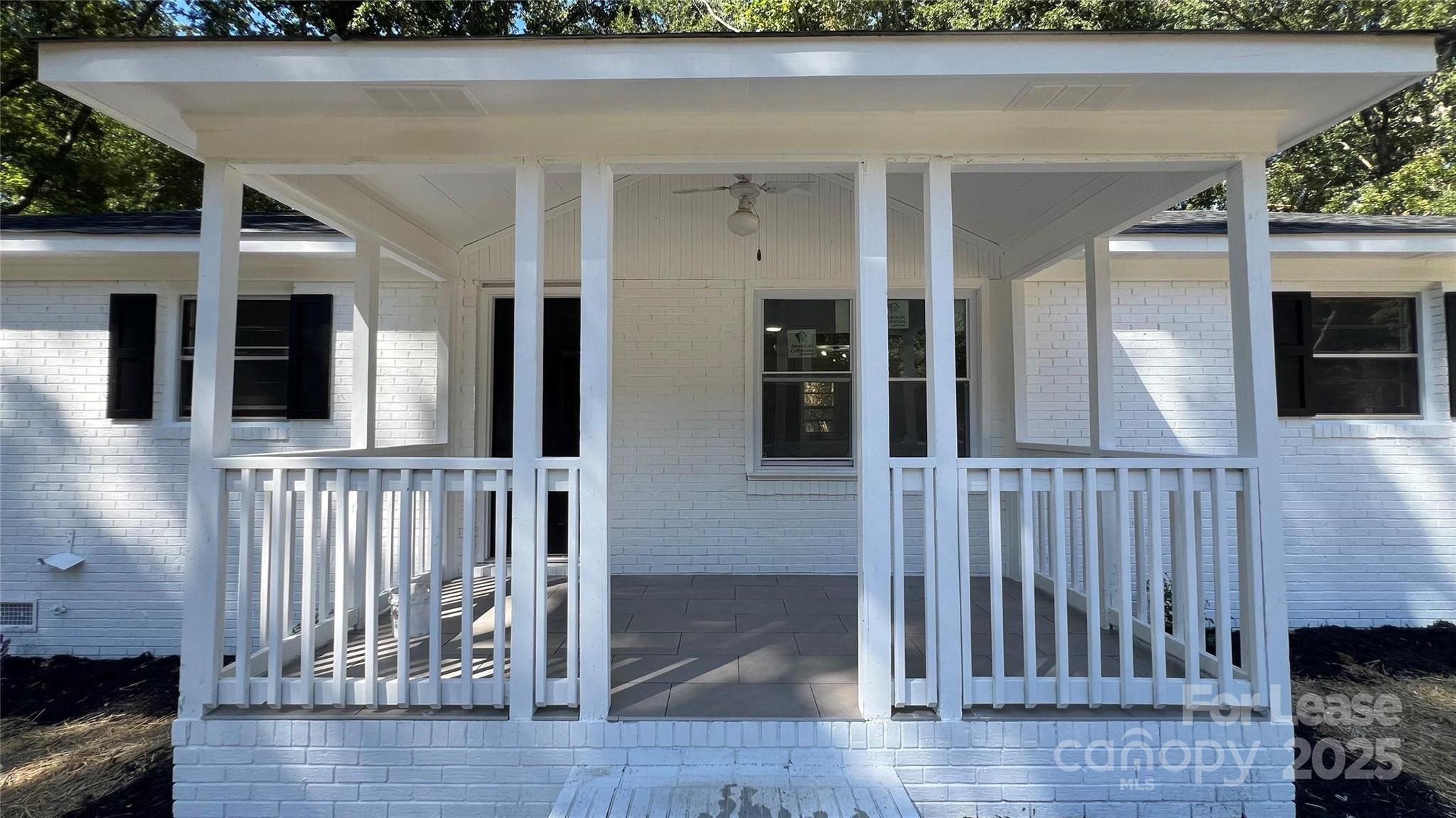 308 Robinson Avenue Matthews, NC 28104 - Photo 14 of 16 an entryway with a white door