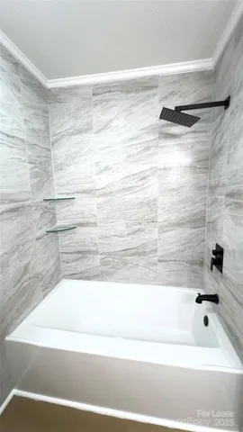 a bathroom with a bathtub