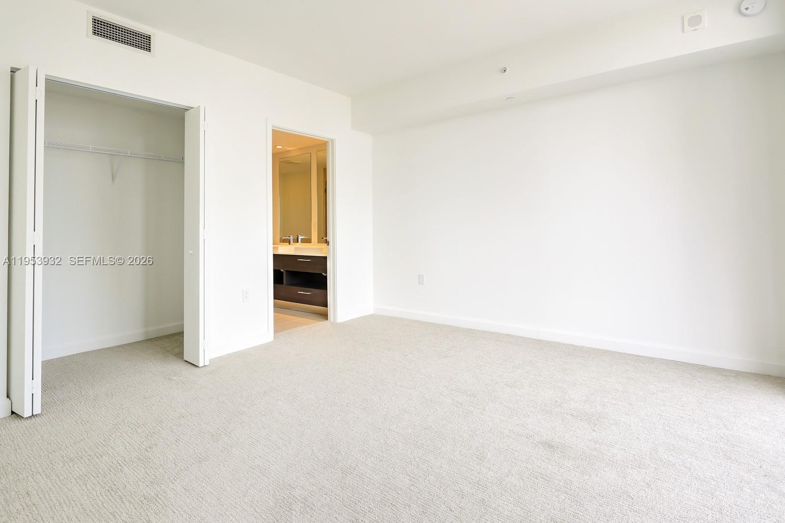 45 Southwest 9th Street, Unit 1806 Miami, FL 33130 - Photo 12 of 61 a view of an empty room with a window