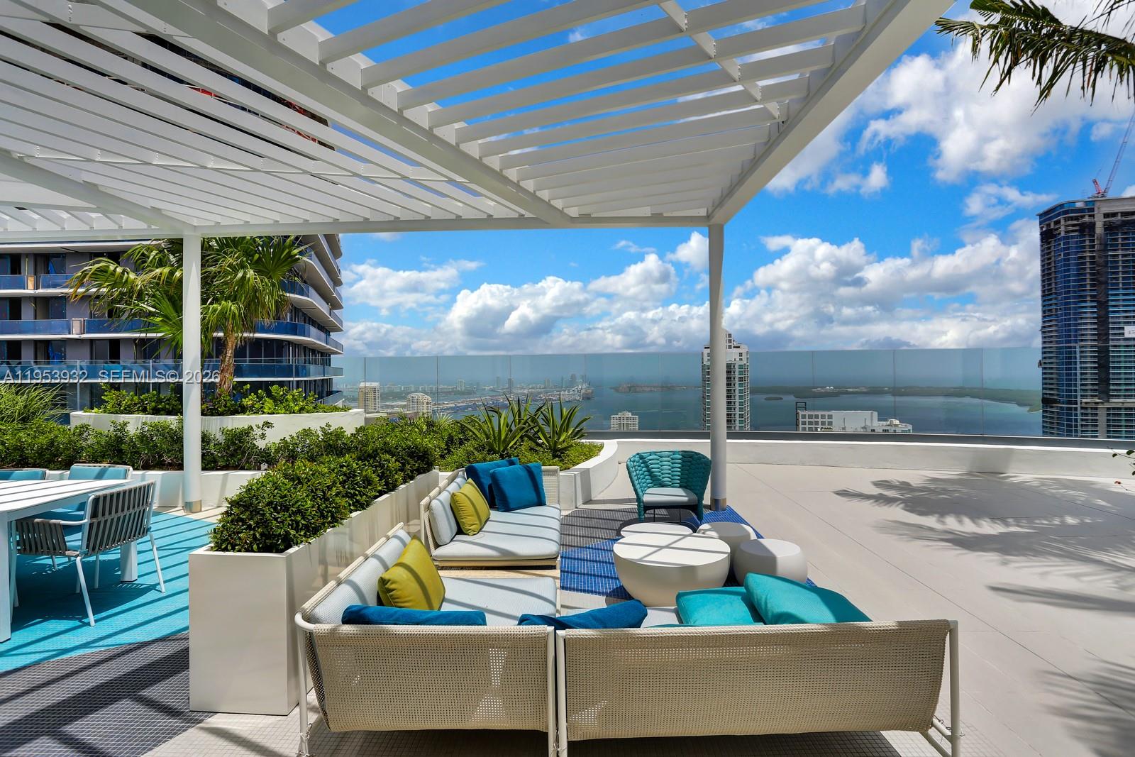 45 Southwest 9th Street, Unit 1806 Miami, FL 33130 - Photo 25 of 61 a outdoor living space with furniture and garden view