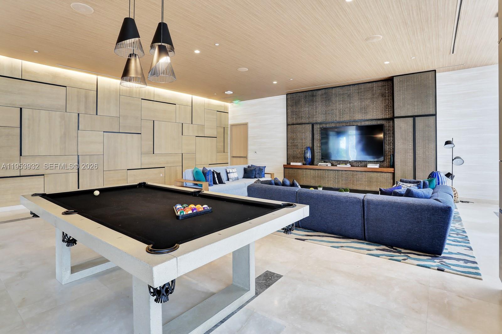 45 Southwest 9th Street, Unit 1806 Miami, FL 33130 - Photo 43 of 61 a kitchen with granite countertop a sink a stove and cabinets