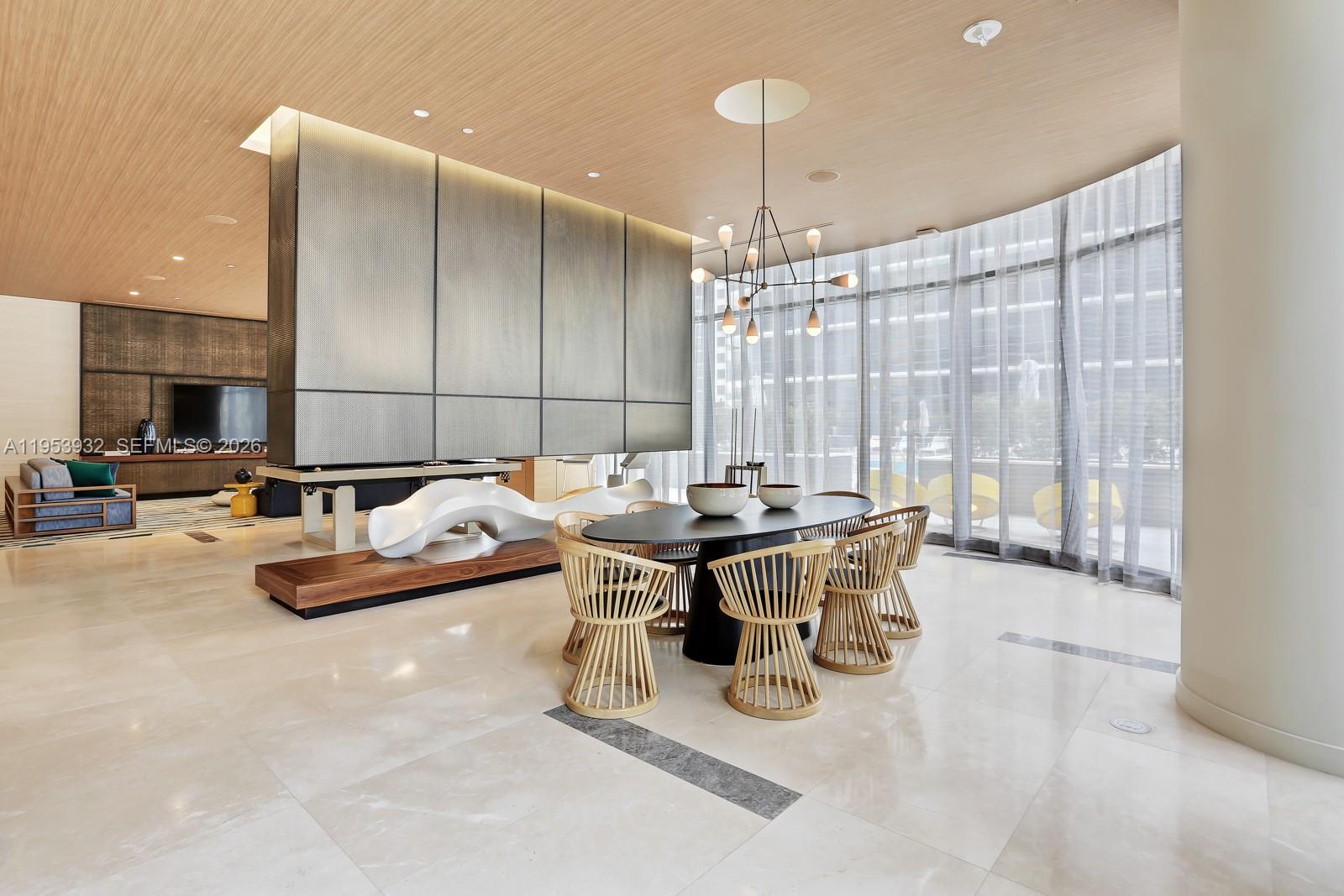 45 Southwest 9th Street, Unit 1806 Miami, FL 33130 - Photo 45 of 61 a view of a dining room with furniture