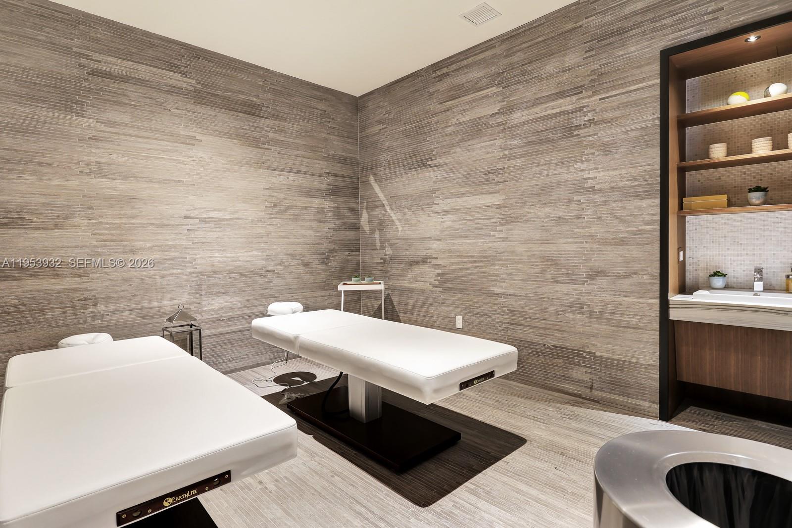 45 Southwest 9th Street, Unit 1806 Miami, FL 33130 - Photo 47 of 61 a bathroom with a sink and a toilet