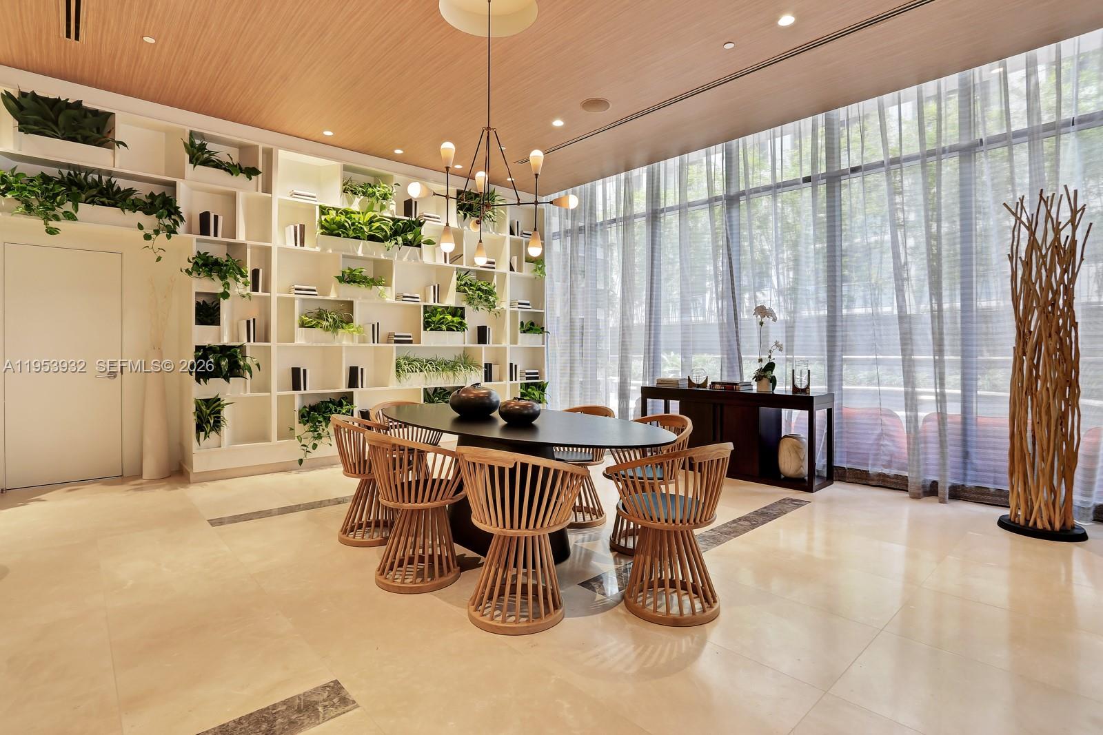 45 Southwest 9th Street, Unit 1806 Miami, FL 33130 - Photo 50 of 61 a view of a dining room with furniture window and outside view