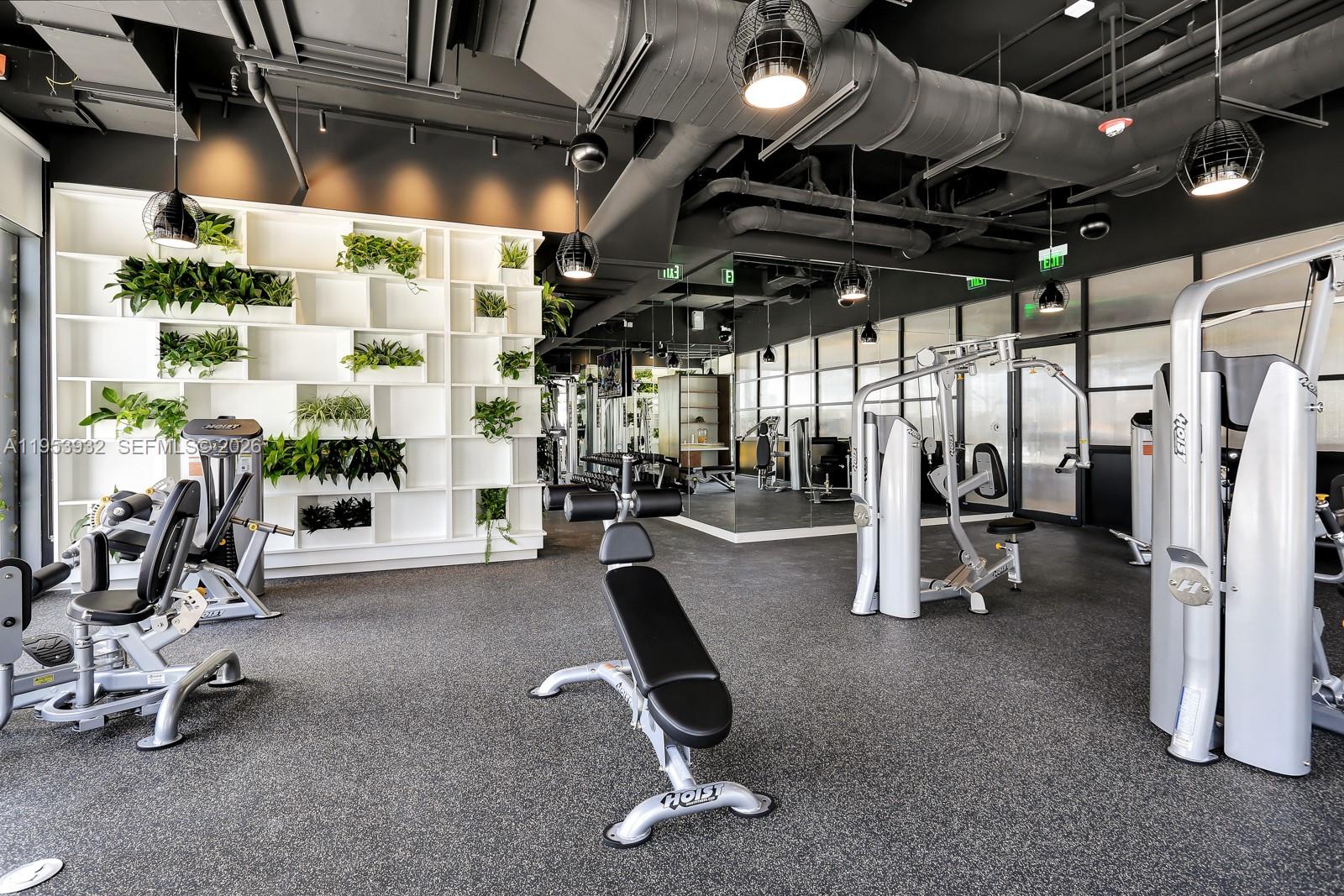 45 Southwest 9th Street, Unit 1806 Miami, FL 33130 - Photo 54 of 61 a view of a room with gym equipment