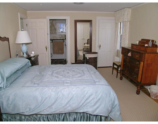 98 Richmond Road Belmont, MA 02478 - Photo 12 of 20 a bedroom with a bed and wooden floor