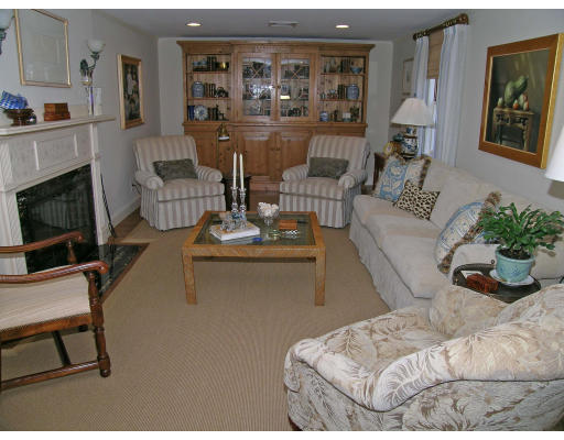 98 Richmond Road Belmont, MA 02478 - Photo 2 of 20 a living room with furniture and a fireplace