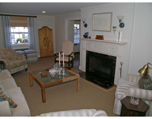 98 Richmond Road Belmont, MA 02478 - Photo 3 of 20 a living room with furniture and a fireplace