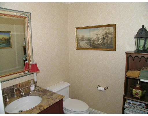 98 Richmond Road Belmont, MA 02478 - Photo 10 of 20 a bathroom with a sink vanity mirror and toilet