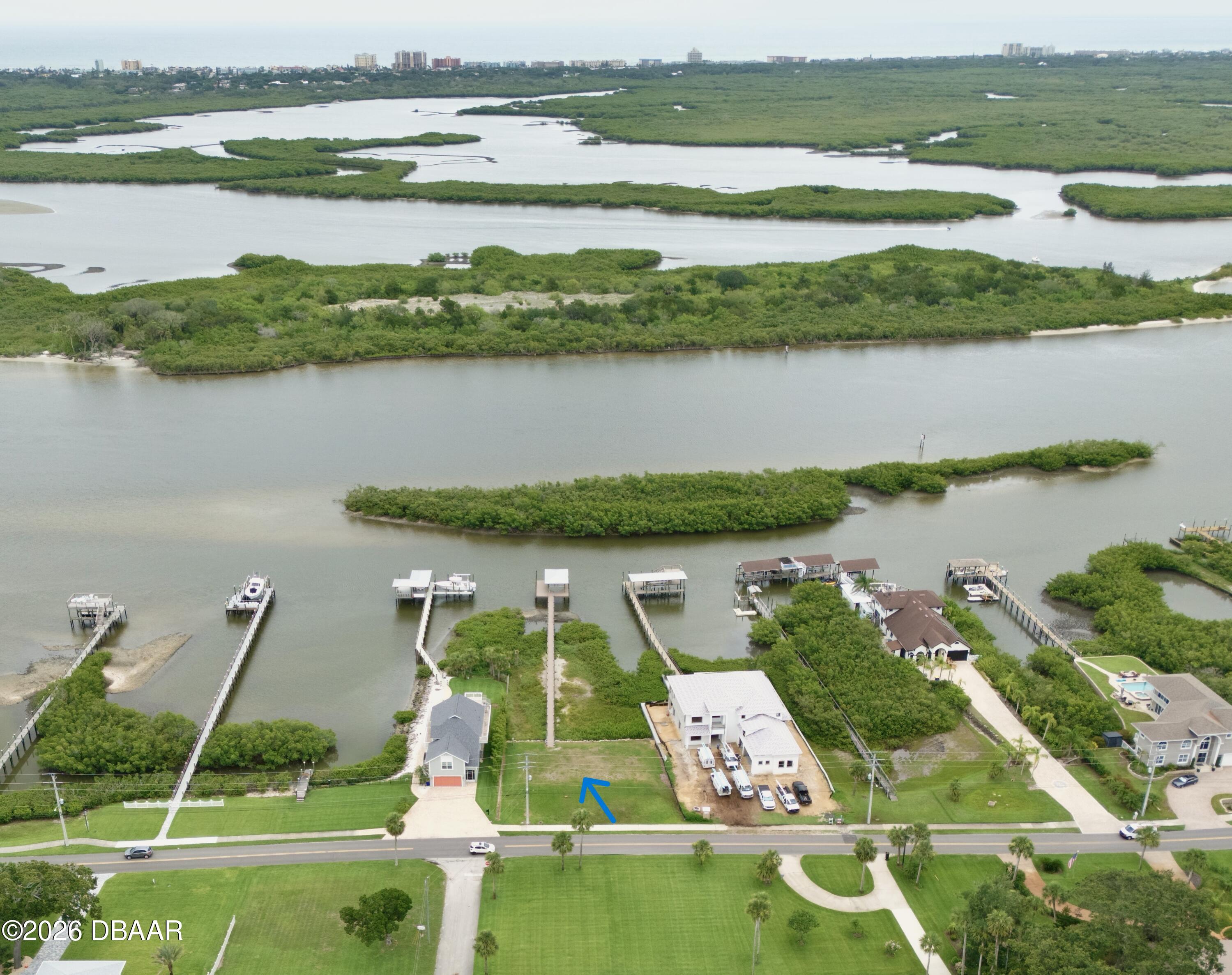 211 North Riverside Drive Edgewater, FL 32132 - Photo 3 of 10 an aerial view of ocean with residential houses with outdoor space and outdoor space